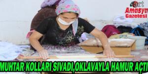 Muhtar kolları sıvadı, oklavayla hamur açtı